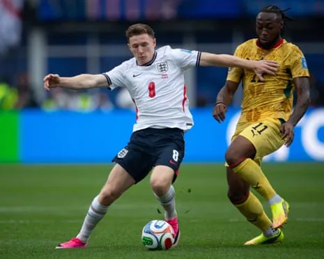 Elliot Anderson holds off Antoine Semenyo during England’s match
