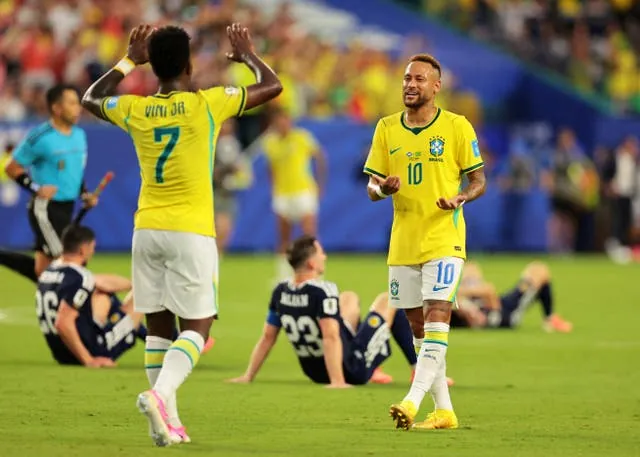 Neymar and Vinicius Jr celebrate against Scotland