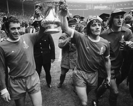 Liverpool’s Ian Callaghan, Kevin Keegan and Ray Clemence parade the winning trophy after the 1974 FA Cup final between Liverpool and Newcastle at Wembley.