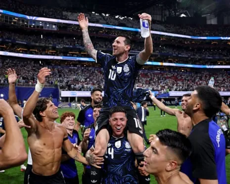 Lionel Messi is held aloft by his teammates after Argentina’s comeback win over England