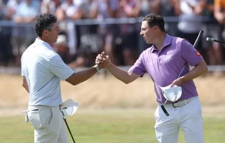 Rory McIlroy and Matt Fitzpatrick shake hands on the 18th hole