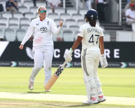 Sophie Ecclestone celebrates taking a wicket