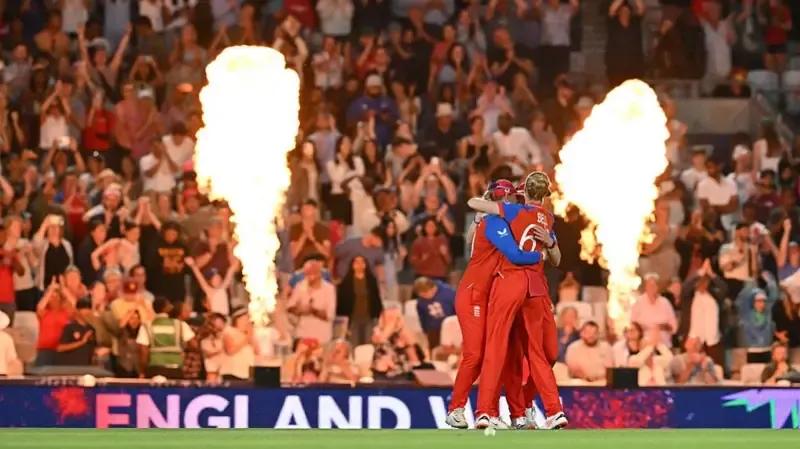 Lauren Bell celebrates with teammates after they won the ICC Women's Twenty20 (T20) cricket world cup 2026 semi-final game between England and South Africa