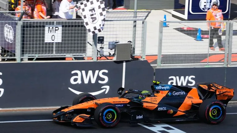 Lando Norris wins the Hungarian GP (AP Photo/Darko Bandic)