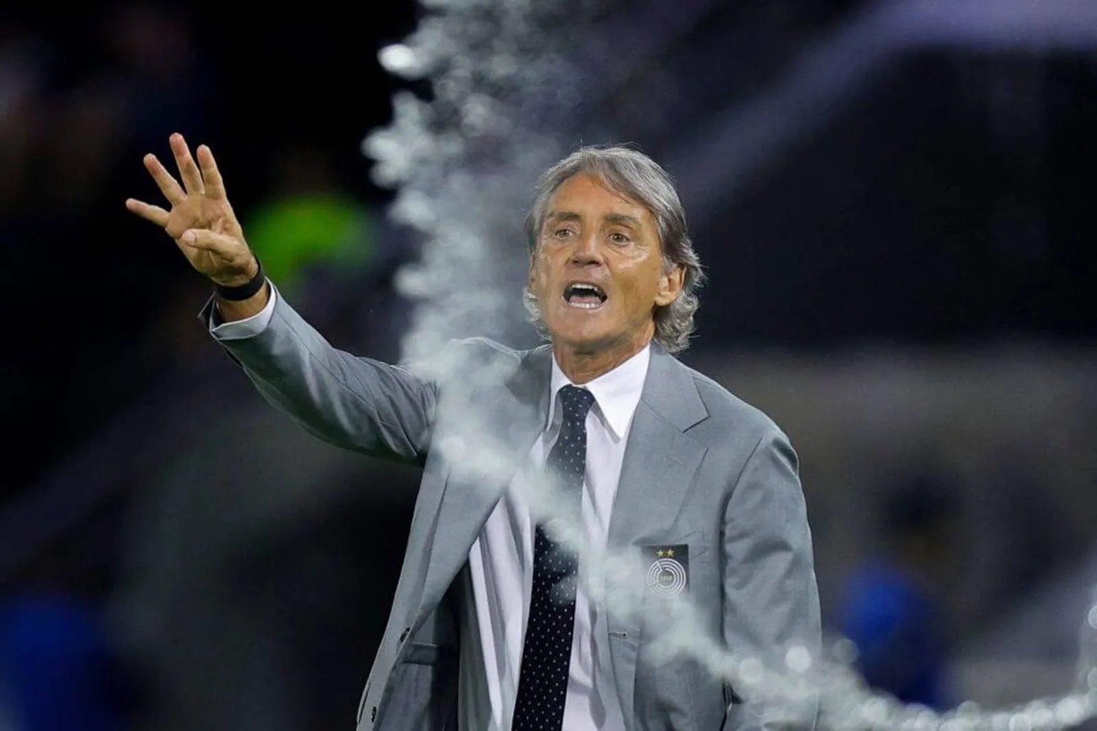 Al Sadd's Italian coach Roberto Mancini instructs his players during the Qatar Stars League match