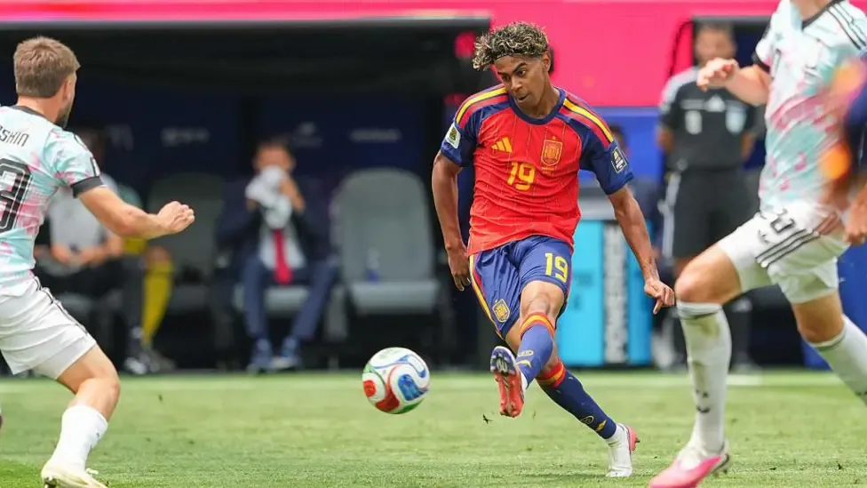 Lamine Yamal plays the ball into the box for Spain