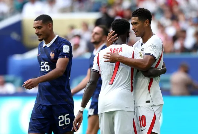 MIAMI GARDENS, FLORIDA - JULY 18: Jude Bellingham #10 and Bukayo Saka #7 of England react during the FIFA World Cup 2026 Bronze Final between France and England at Miami Stadium on July 18, 2026 in Miami Gardens, Florida. (Photo by Eddie Keogh - The FA/The FA via Getty Images)
