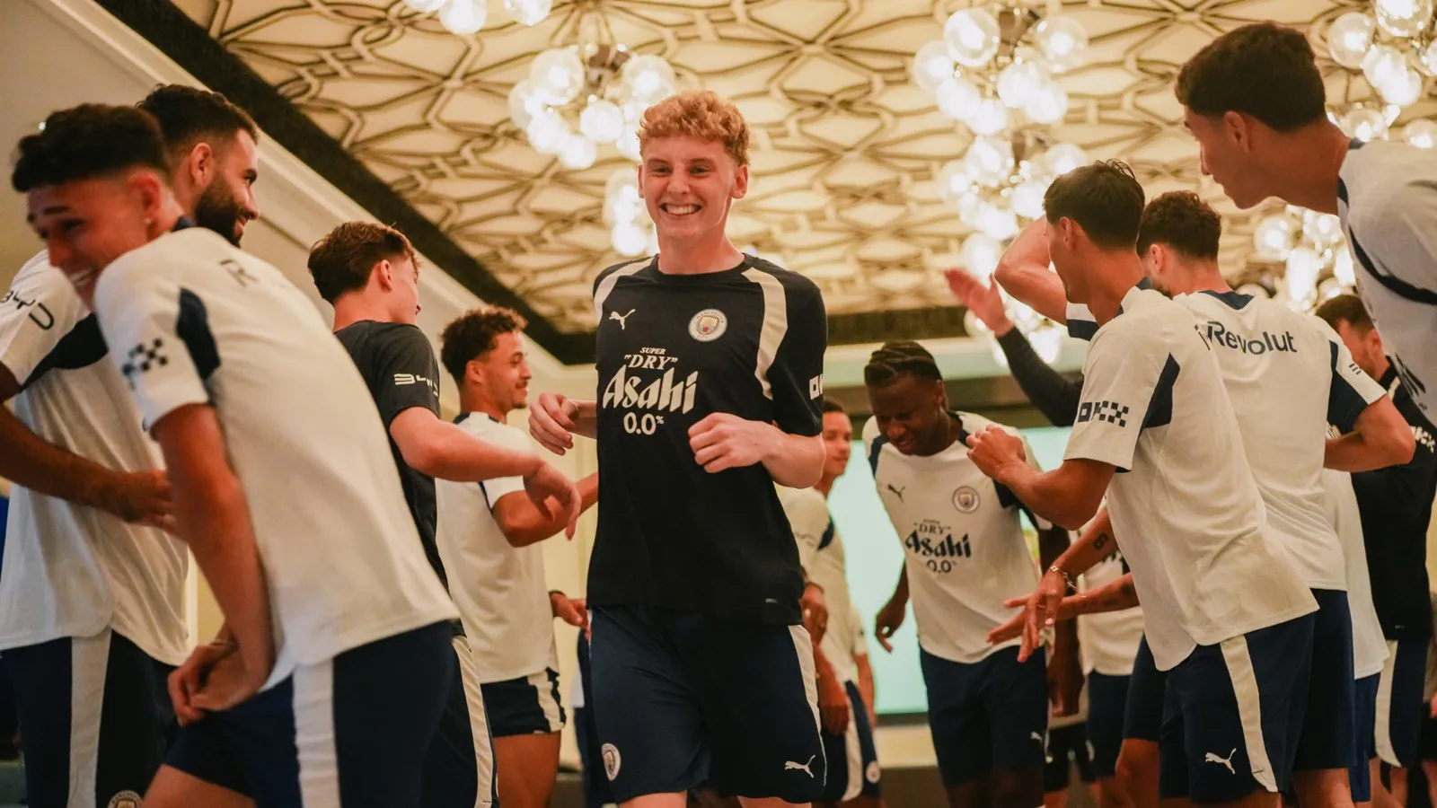 BUMPS! : Jack Wint being provided with a warm pre-season tour welcome.