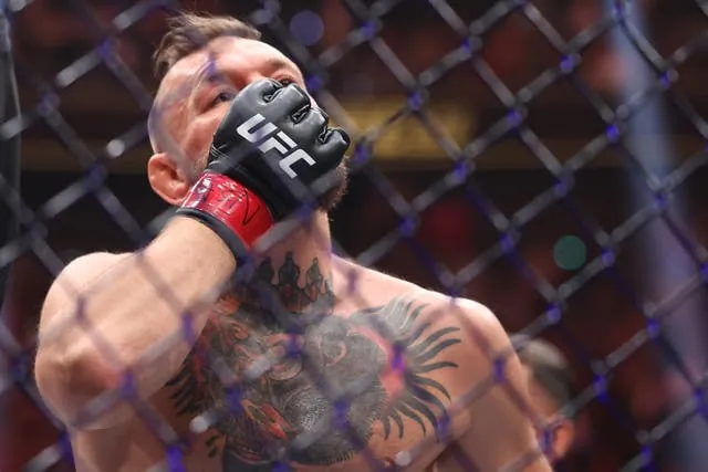 A dejected Conor McGregor after sustaining a new injury